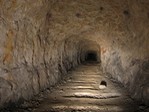 An adit of unfinished german underground factory at Alkazar.